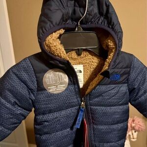 NWT North Face Infant warm winter hooded jacket.